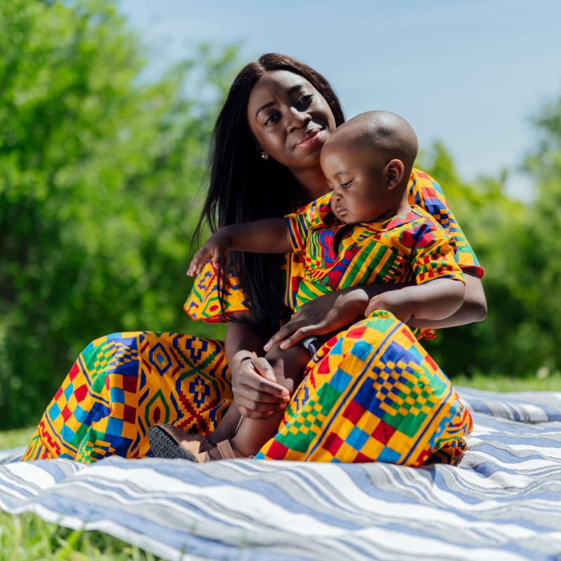 woman-with-her-son-in-the-park-looking-at-the-came-2025-01-08-15-16-13-utc-1-2-2048x1363